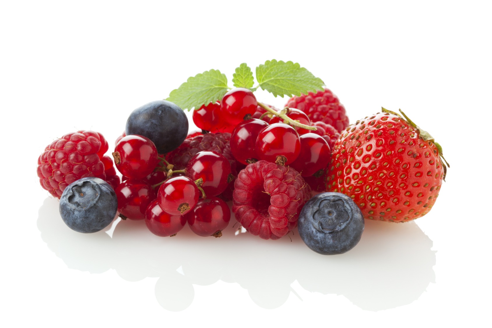 assortment of berries set against a white background